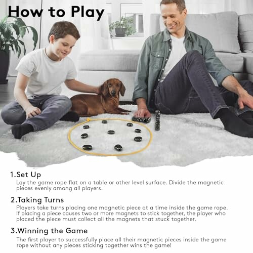 Father and son playing a magnetic game with a dog watching.