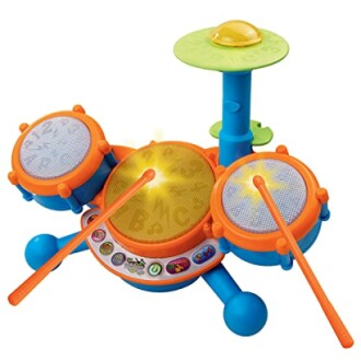 Colorful children's toy drum set with lights.